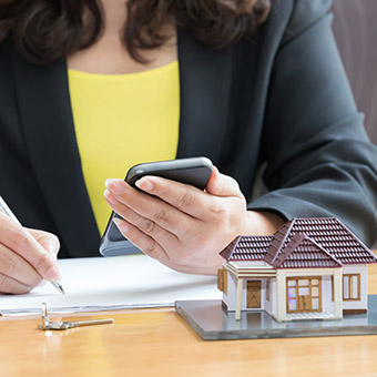 Business woman conducting a property check