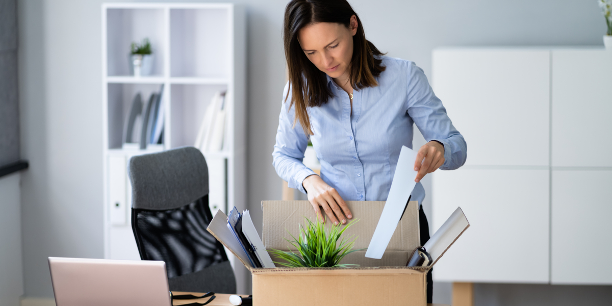 Woman packing up desk