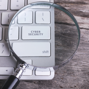 Cyber security words on a key board